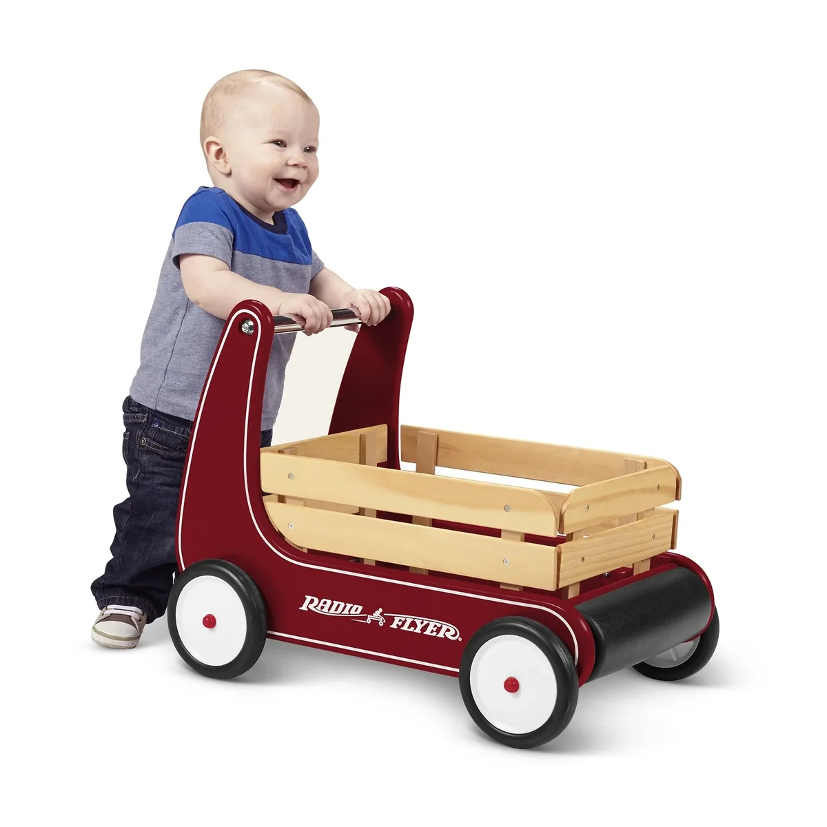 Toddler using the Radio Flyer Classic Walker Wagon as a push walker