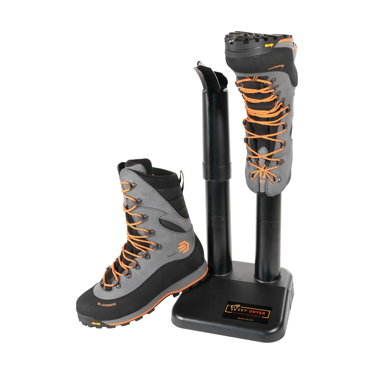 PEET Original boot dryer with a grey and orange Lacrosse mountaineering boot drying on one tube and a second boot beside it, showing an exposed drying tube