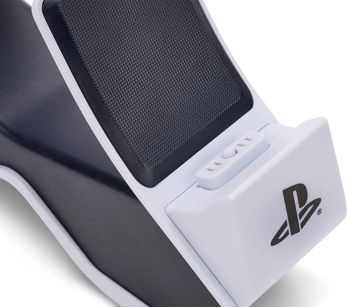 Close-up of the PowerA Twin Charging Station click-down cradle showing the charge-level LED window and PlayStation logo