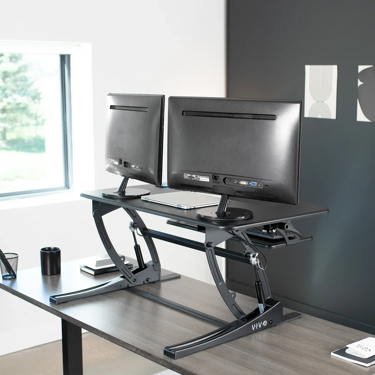 VIVO 32" Desk Converter rear angle showing gas spring lift mechanism and dual monitor setup