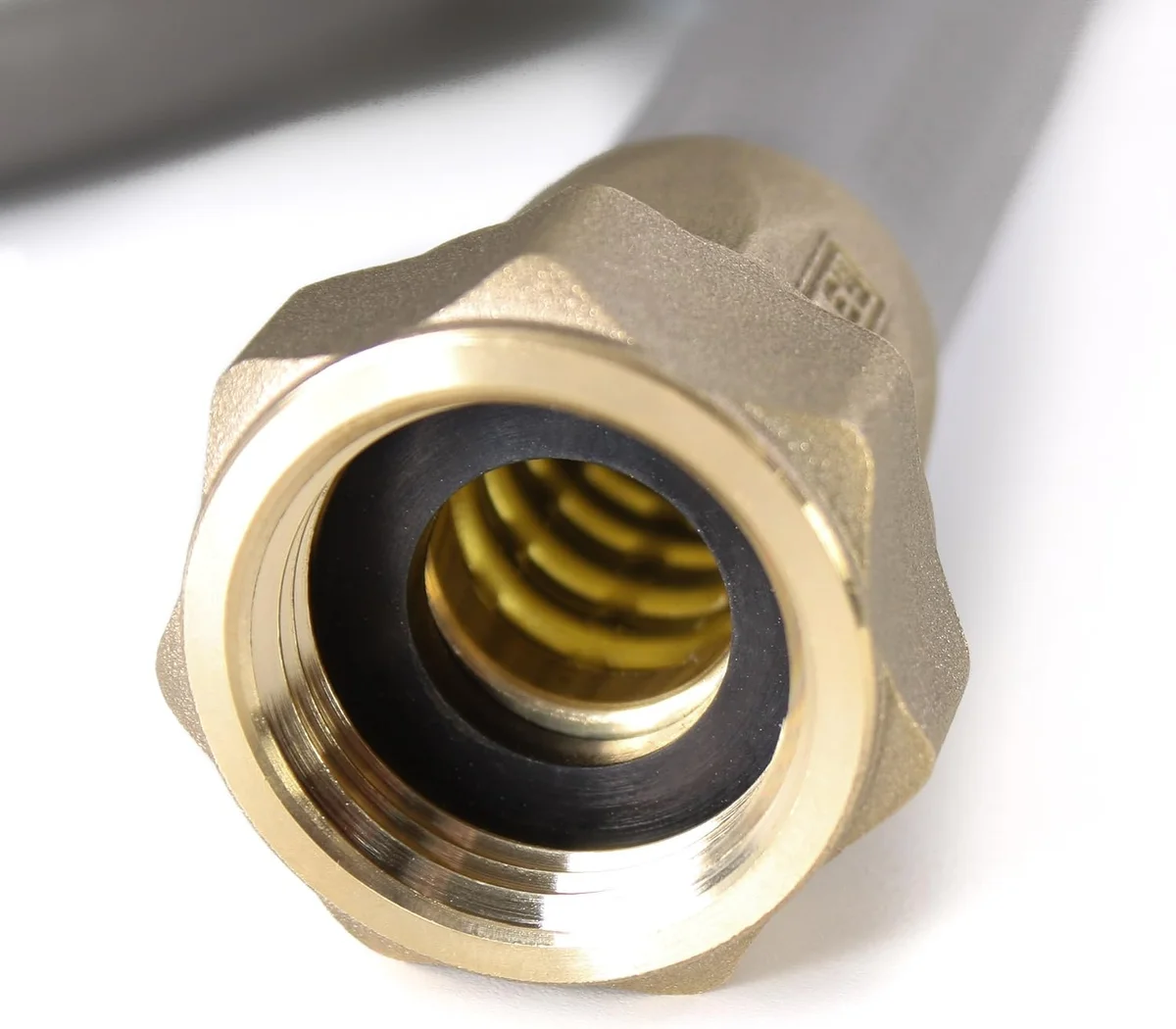 Close-up of Eley hose brass female fitting showing crush-resistant collar and interior threads