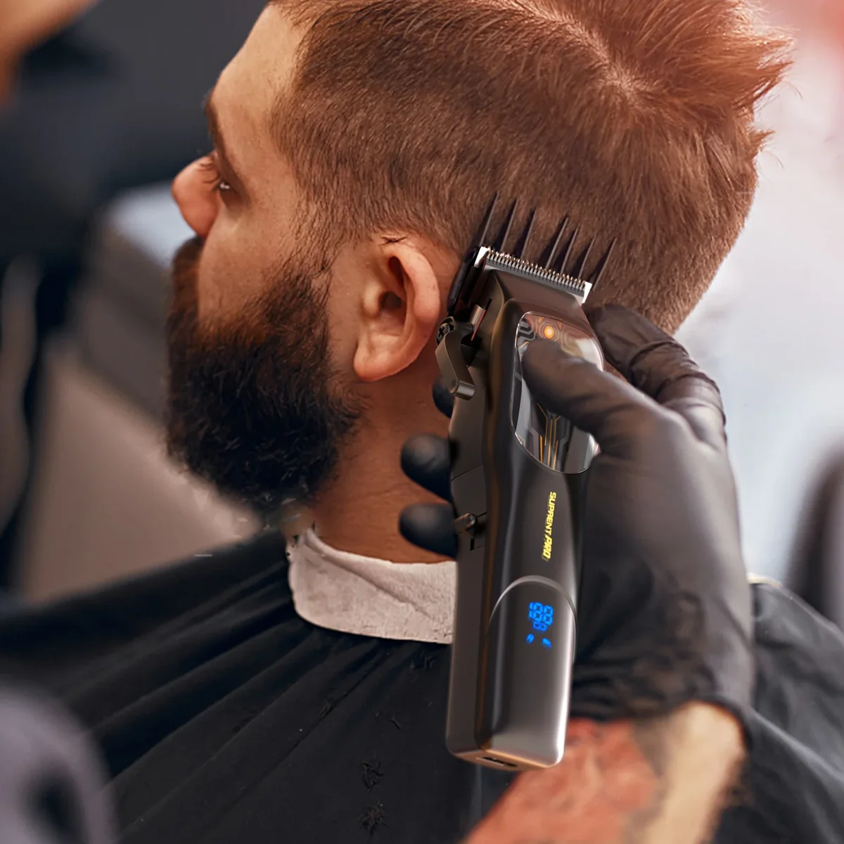 Barber using the Suprent Pro Mecha clipper to cut a client's hair in a barbershop
