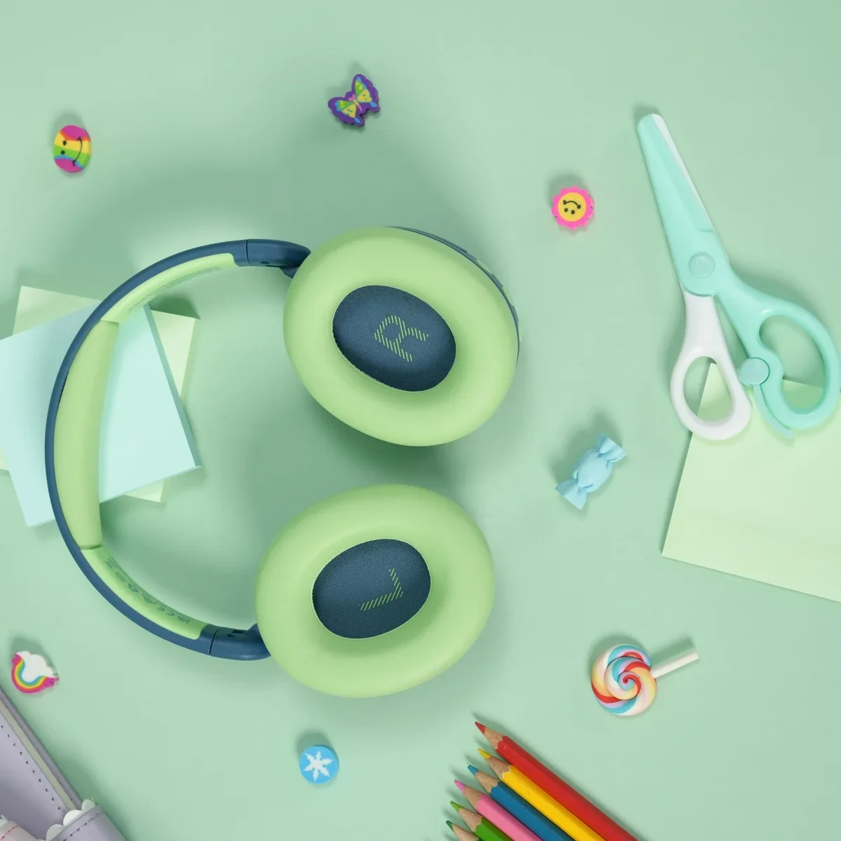 Child with the iClever BTH20 headphones resting around the neck