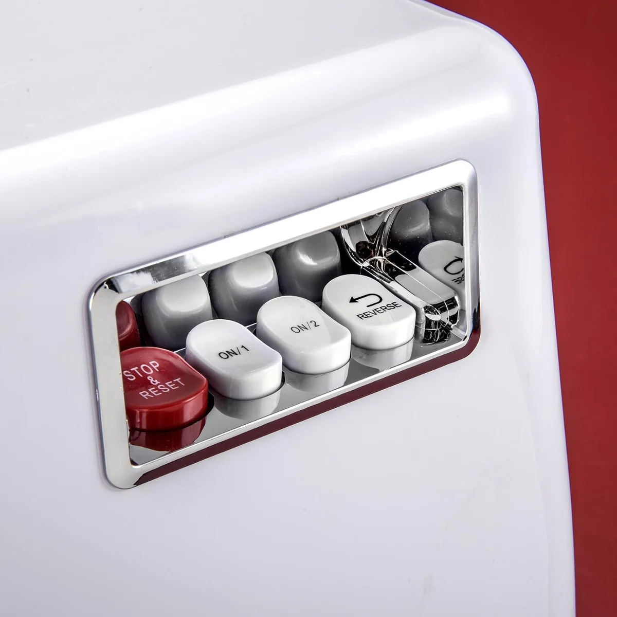 STX Turboforce 3000 control panel close-up with Stop & Reset, On/1, On/2, and Reverse buttons