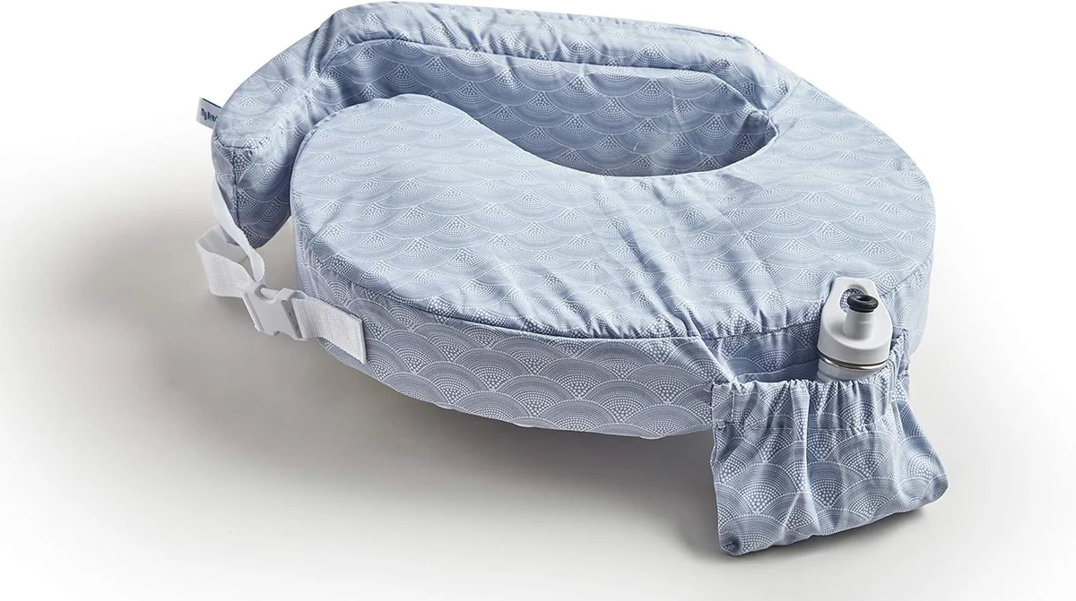 My Brest Friend Original Nursing Pillow front view showing firm flat surface, wraparound buckle strap, and side pocket