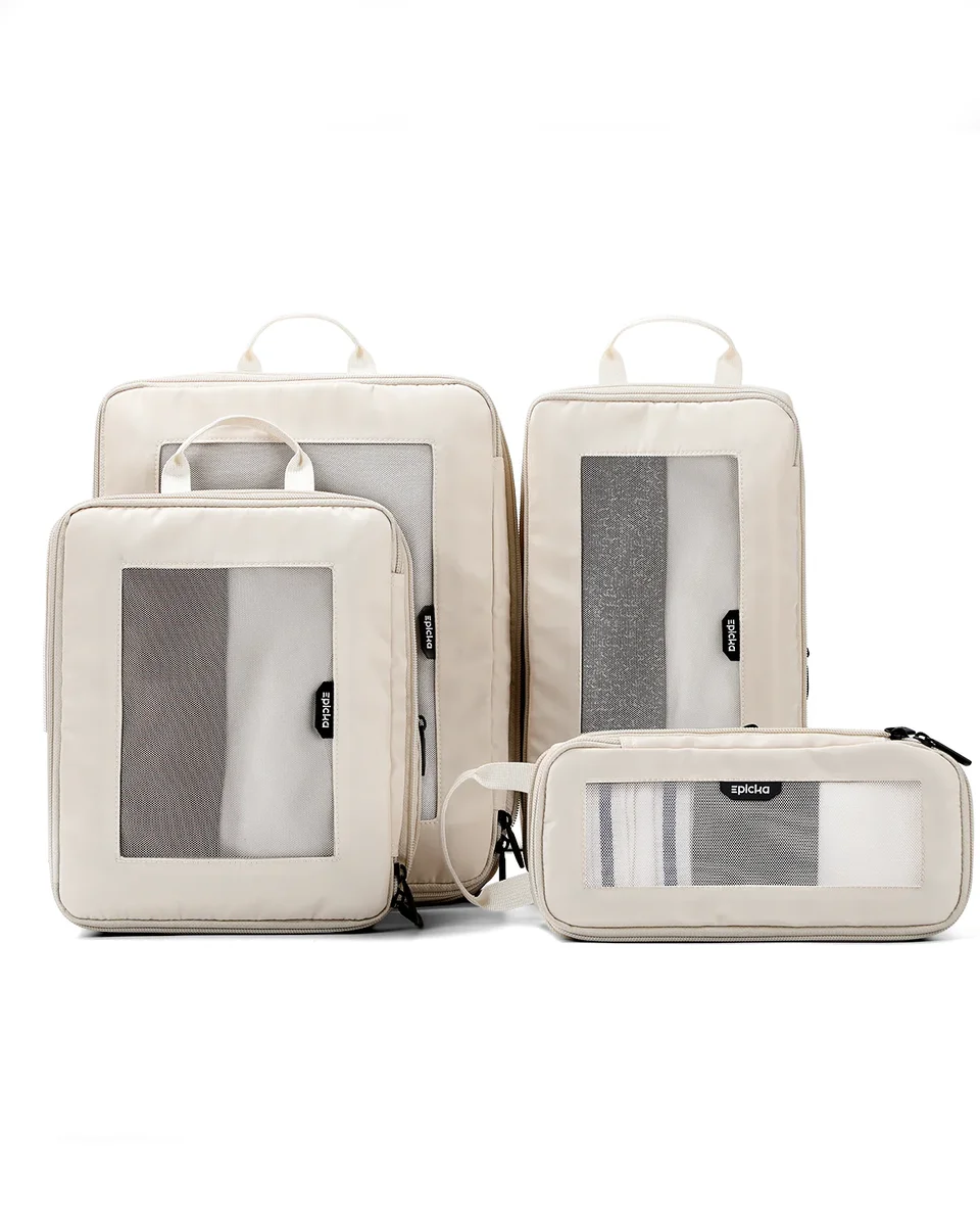 Epica Trip Cozy 4-Piece Set in cream packing cubes on white background