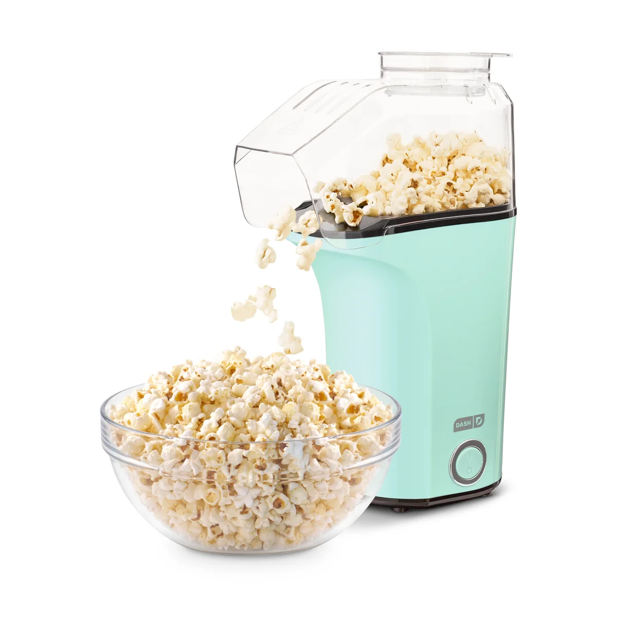 Dash Fresh Pop aqua hot air popcorn maker pouring fresh popcorn into a glass bowl