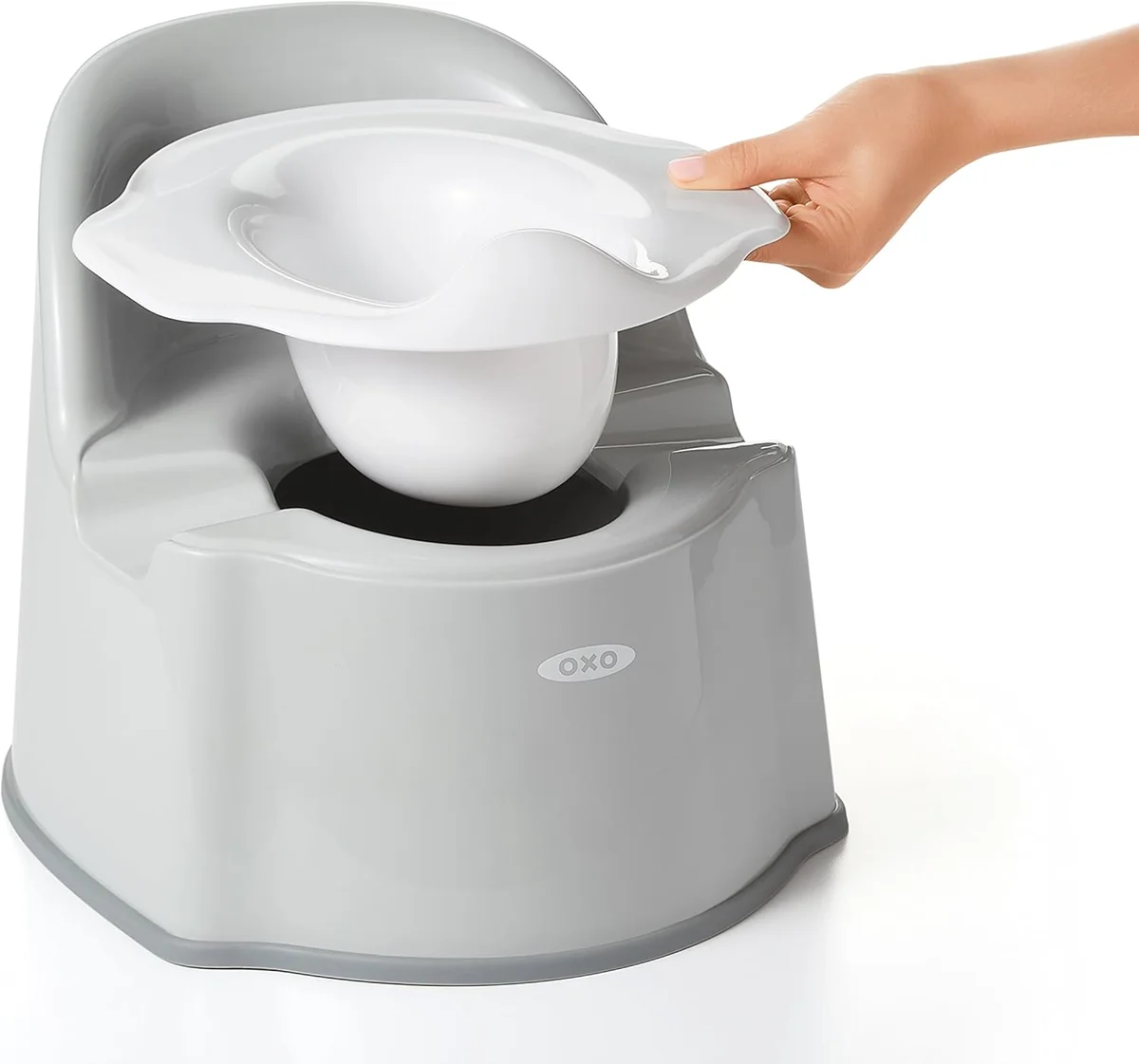 OXO Tot Potty Chair with removable inner bowl being lifted out