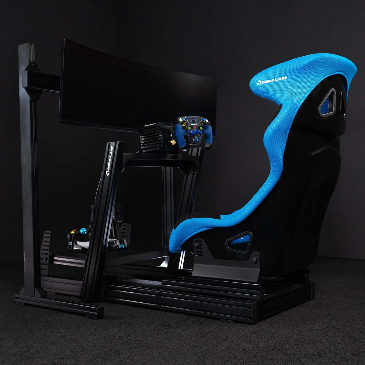 Sim-Lab GT1 Pro fully built rig with Fanatec wheel, monitor stand and blue Sim-Lab seat mounted on the 80/20 aluminium frame