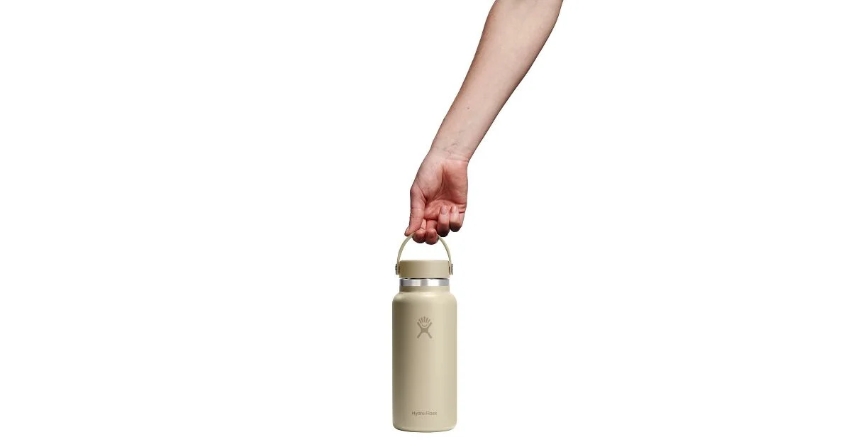 Hydro Flask Wide Mouth 32 oz carried by its Flex Cap handle