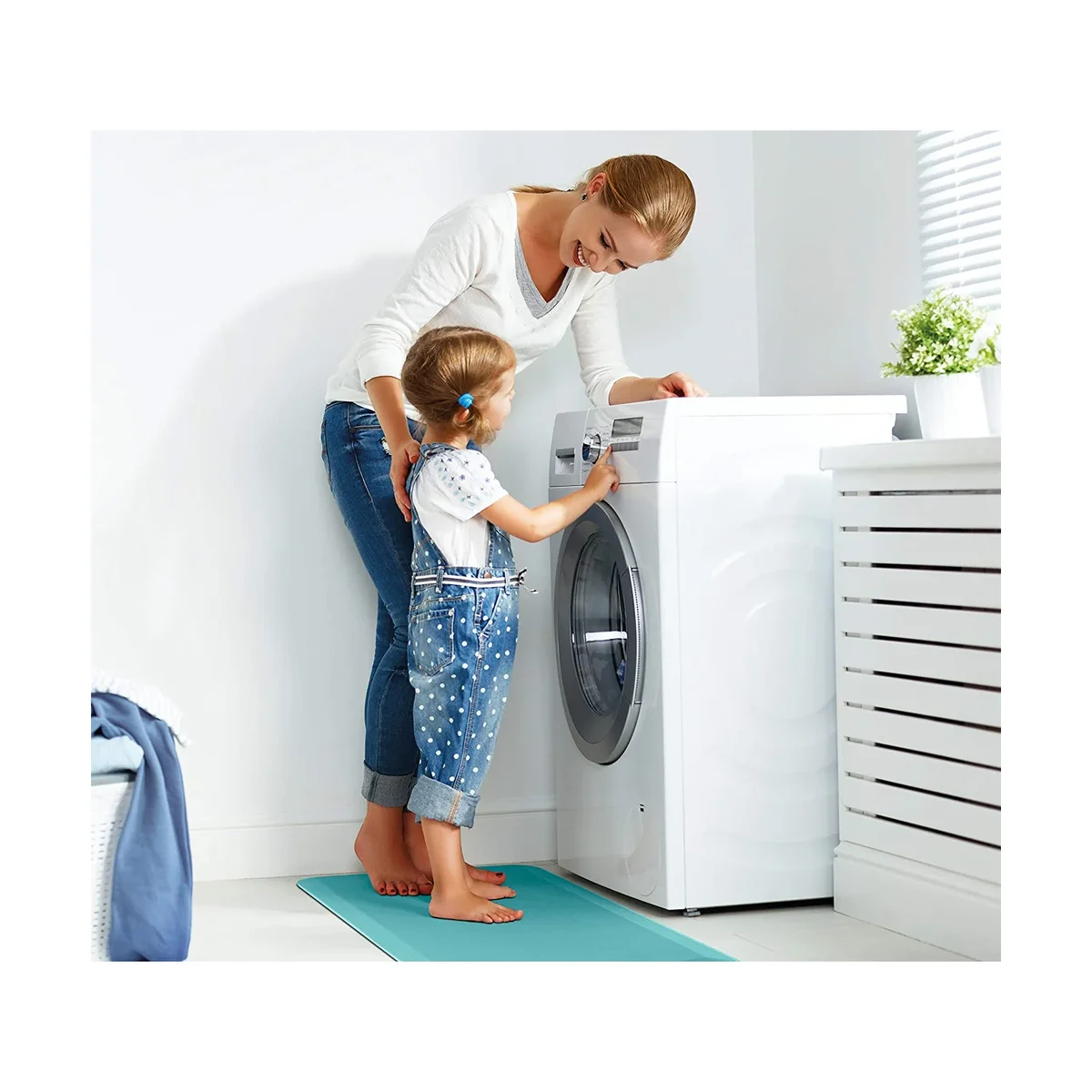 ComfiLife Anti-Fatigue Floor Mat in teal in a laundry room with a person standing on it