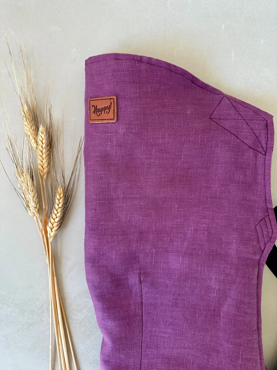 Happy Baby Original carrier in amethyst laid flat showing the hood and sun shade zipper pocket area