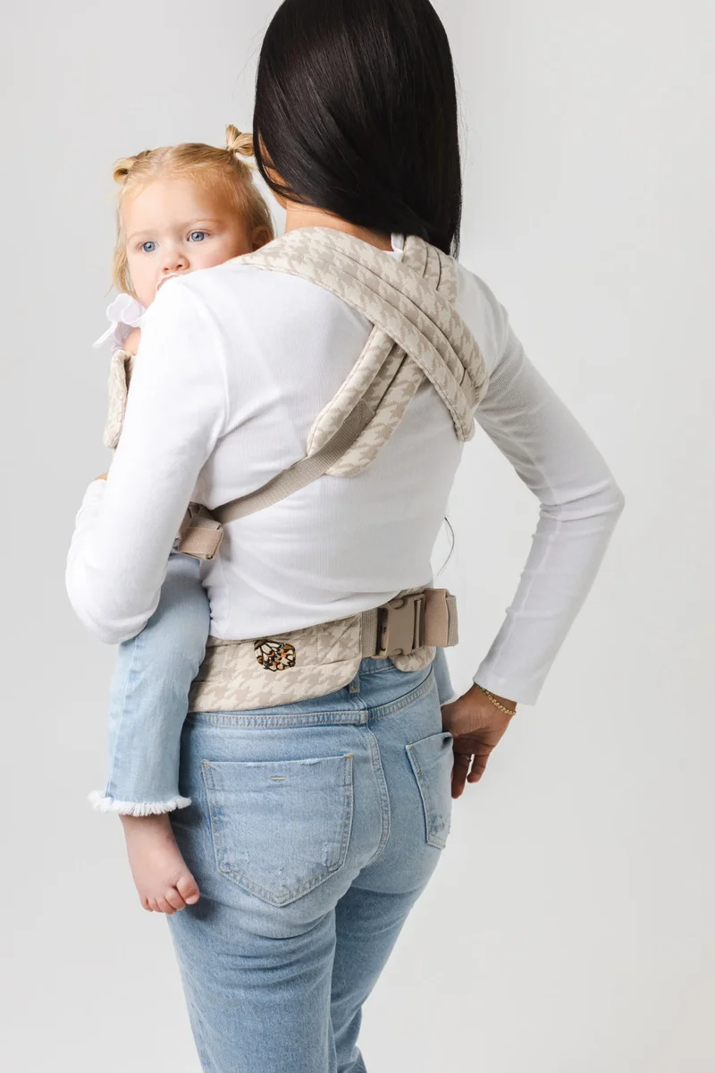 Mabe Monarch carrier worn in back carry position showing toddler and X-cross padded back straps