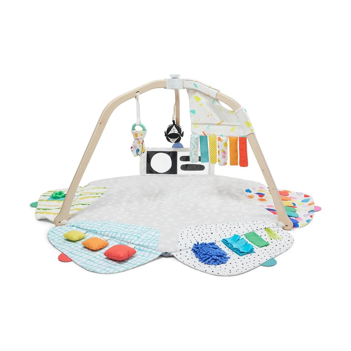 Lovevery The Play Gym fully assembled with wooden arch, hanging toys, and star-shaped play mat on a white background