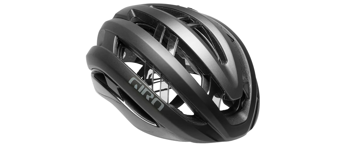 Giro Aries Spherical road bike helmet in matte black graphite, top-down 3/4 view showing 24-vent design