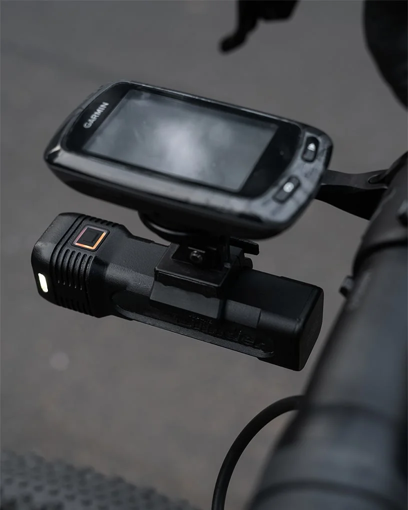 Knog Blinder 1300 rear view showing battery indicator and mount system detail