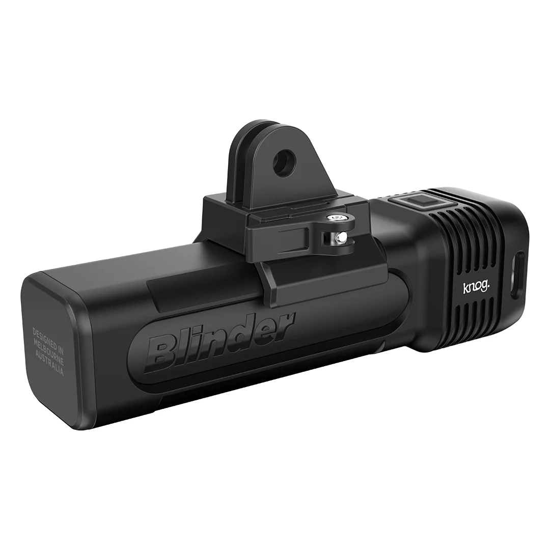 Knog Blinder 1300 front bike light with GoPro mount, side profile on white background