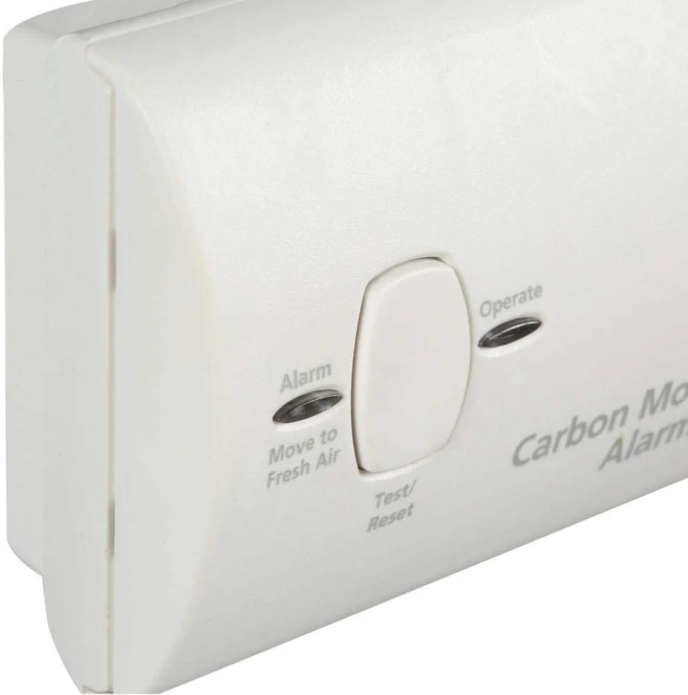 Kidde KN-COB-B-LPM carbon monoxide alarm three-quarter angle view showing side profile and vent slots
