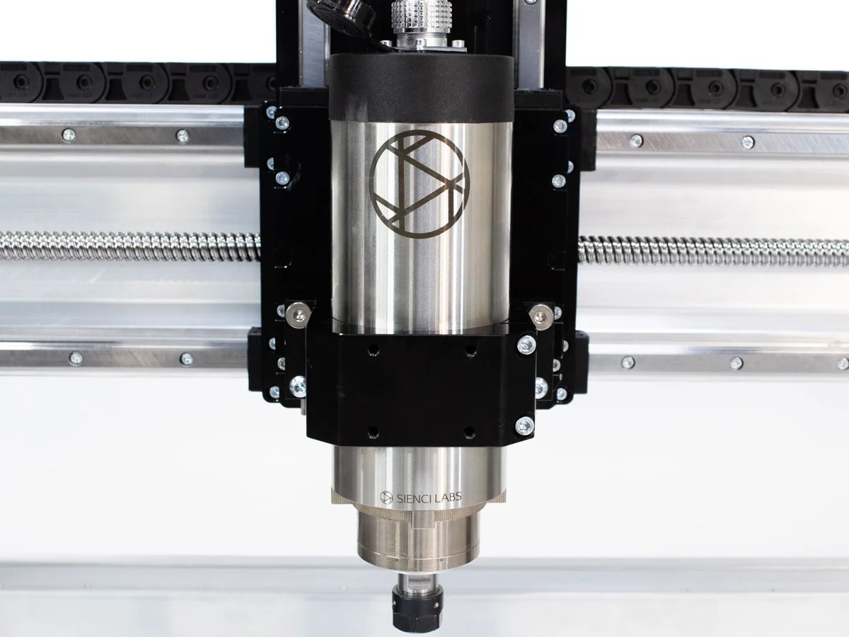 Close-up of the Sienci Labs AltMill spindle mount and Z-axis carriage with the Sienci Labs logo visible on the spindle housing