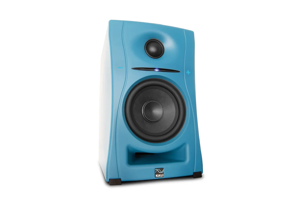 Kali Audio LP-UNF three-quarter angle view in blue showing the speaker profile, white rear panel, and front bass port