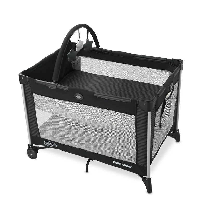 Graco Pack 'n Play On the Go playard in Kaden colorway, 3/4 view with toy bar and bassinet insert