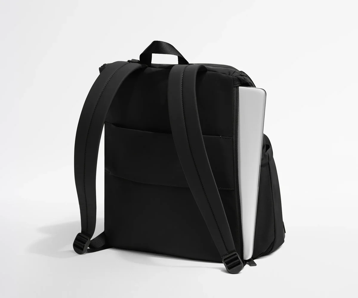Away Featherlight Diaper Backpack side view with laptop sleeve open