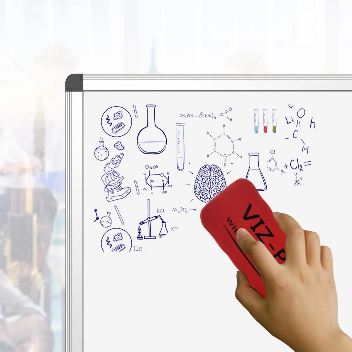 Close-up of the VIZ-PRO whiteboard's silver aluminum frame corner with a red eraser wiping the surface