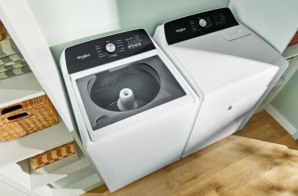 Whirlpool WED5010LW dryer overhead angle showing control panel alongside open washer drum