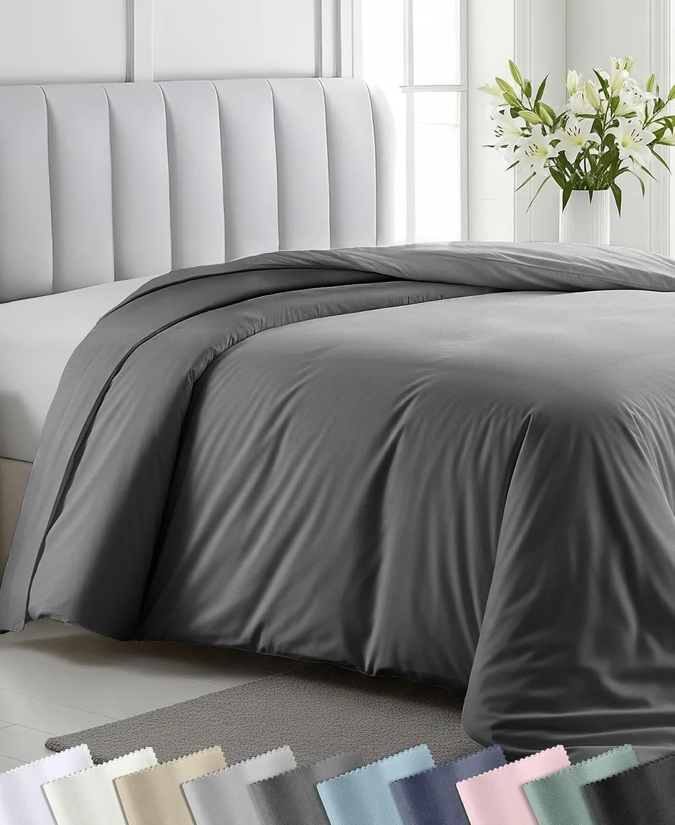 California Design Den 400 thread count cotton sateen duvet cover in grey styled on a bed