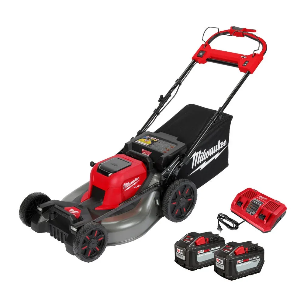 Milwaukee M18 Fuel 21" mower front-facing 3/4 angle with two M18 REDLITHIUM HD12.0 batteries and charger on white background