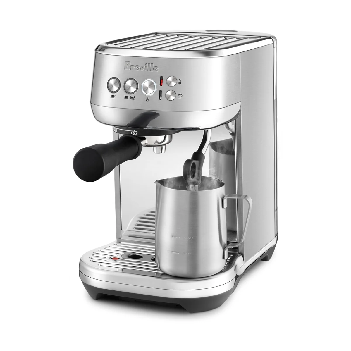 Breville Bambino Plus automatic steam wand frothing milk in a stainless jug on the temperature sensor pad