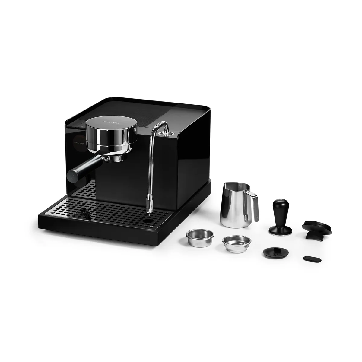 Fellow Espresso Series 1 in Matte Black from the steam wand side, shown with its included milk pitcher, tamper and filter baskets