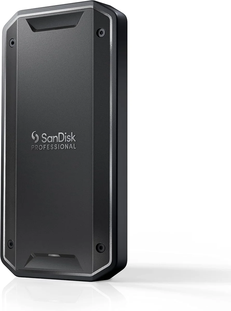 SanDisk Professional PRO-G40 portable SSD in dark grey aluminum with black rubberized bumper, three-quarter studio view