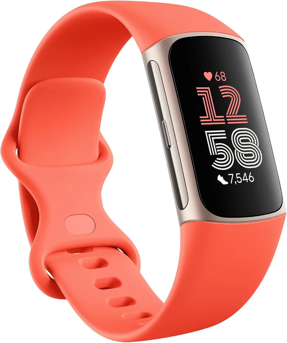 Fitbit Charge 6 in Coral colorway showing the AMOLED display and band