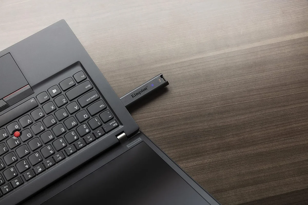 Kingston DataTraveler Max USB-C flash drive plugged into a laptop USB-C port