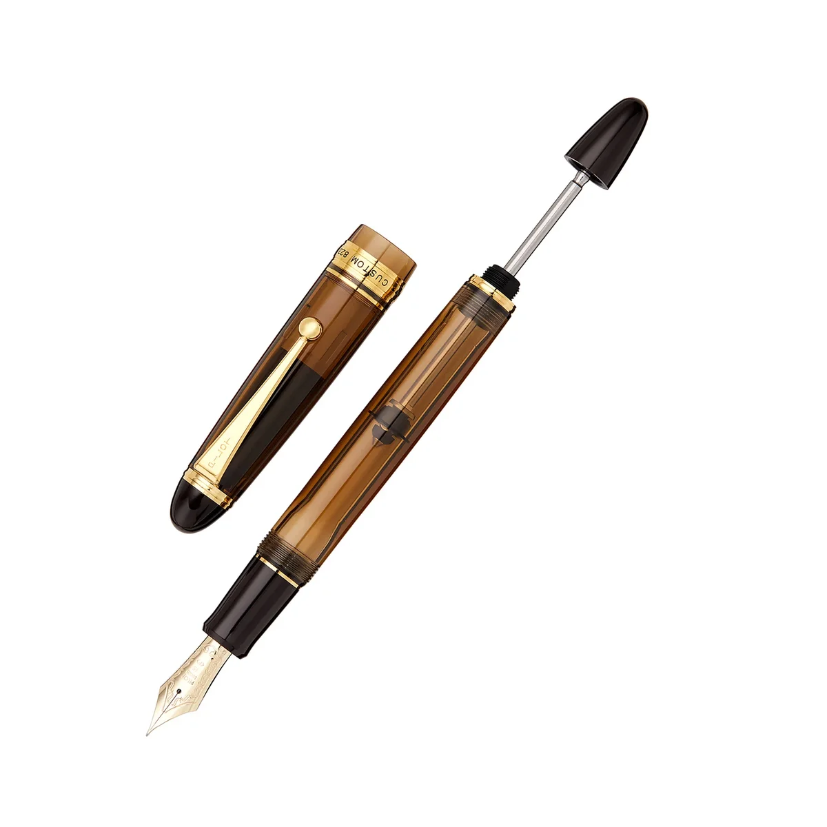 Pilot Custom 823 amber demonstrator uncapped, revealing the 14k gold nib and the transparent barrel of the vacuum filling system