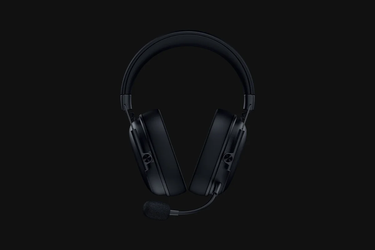 Razer BlackShark V3 X HyperSpeed front view showing the headband, steel suspension wires, ear cups and boom mic