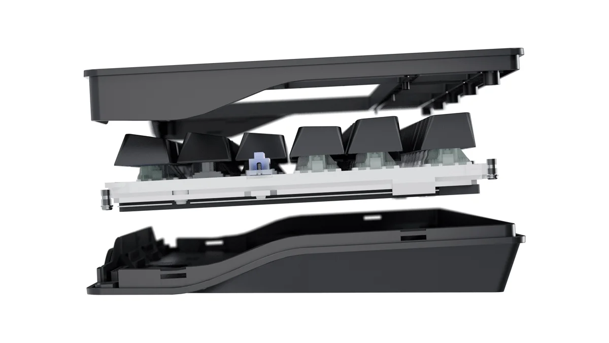 Wooting 80HE exploded view of the gasket-mount internals: top case, keycaps, Hall effect switches, plate and bottom case