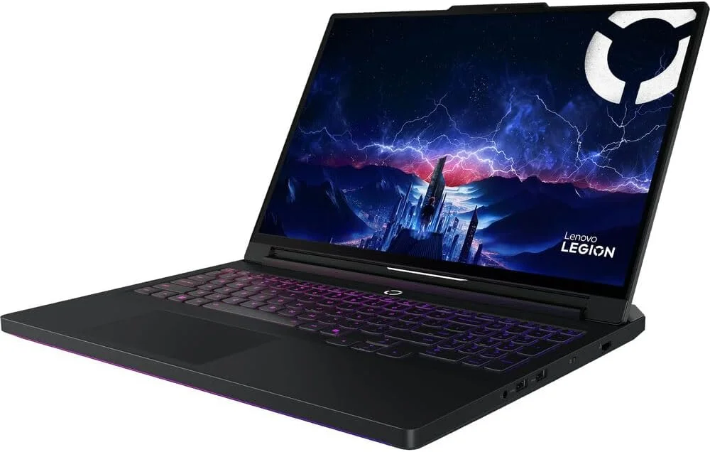 Lenovo Legion Pro 7i Gen 10 three-quarter angle view showing the keyboard, OLED display, and right-side port layout