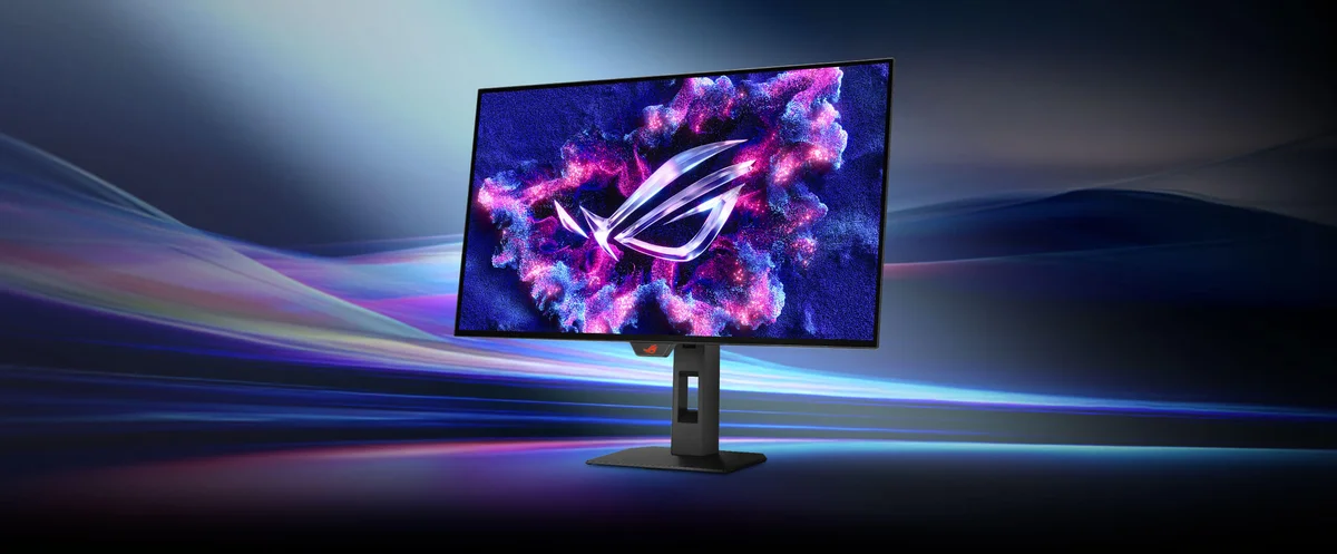 ASUS ROG Strix XG27AQWMG lifestyle shot with colorful gaming scene