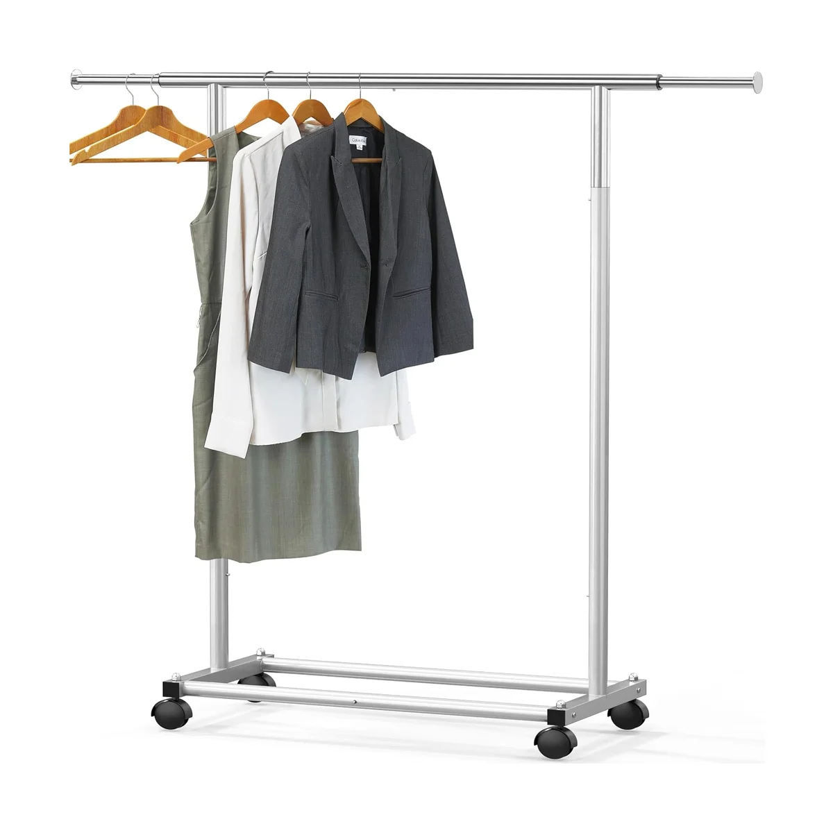 Simple Houseware Standard Rod Garment Rack in silver chrome with a dress, blouse and blazer on wooden hangers, on a white background