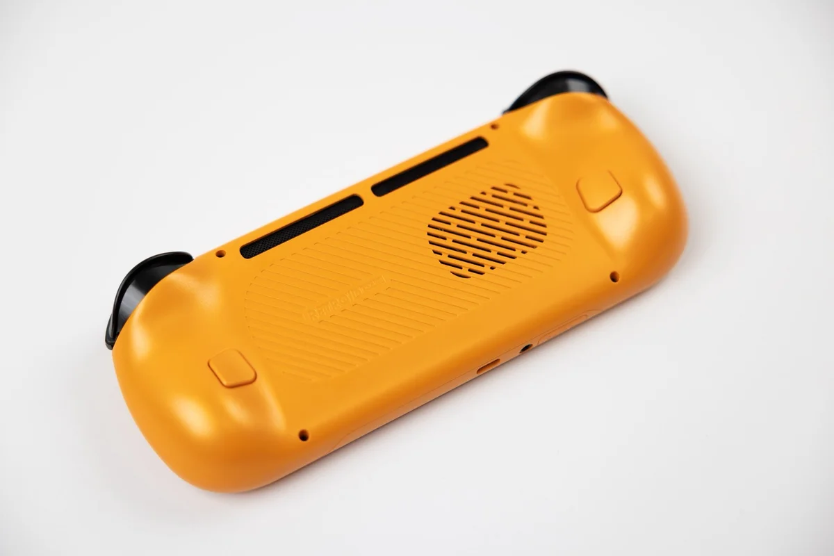 Retroid Pocket 6 orange rear view showing textured back panel and active cooling vent