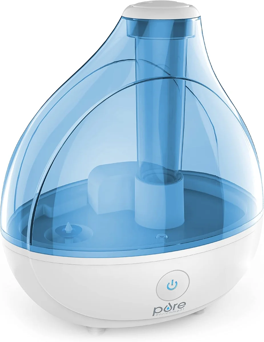 Pure Enrichment MistAire humidifier three-quarter angle view showing the translucent blue tank, internal mist tube and rounded white base