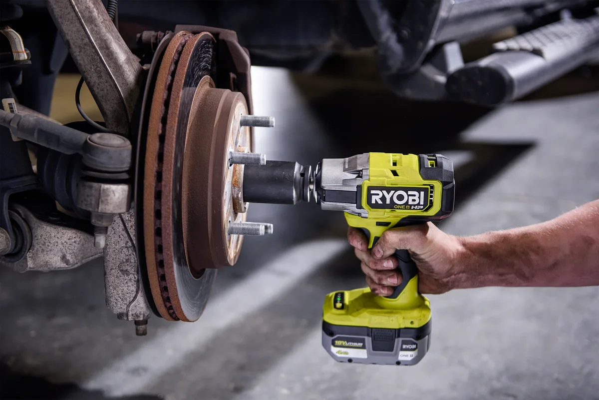 Ryobi P262 Impact Wrench removing brake rotor in automotive repair