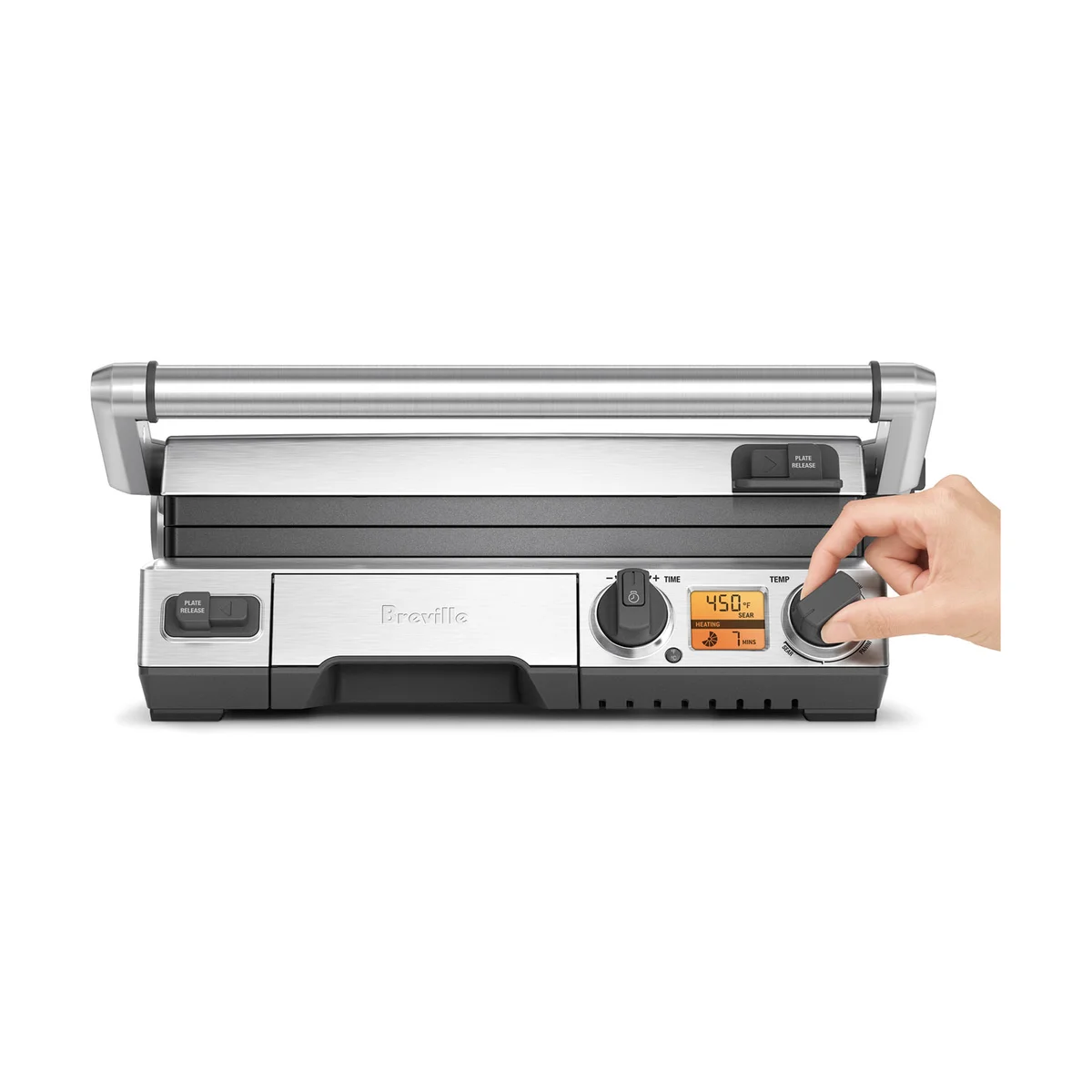 Front view of the Breville Smart Grill BGR820XL with a hand turning the temperature dial beside the orange LCD display
