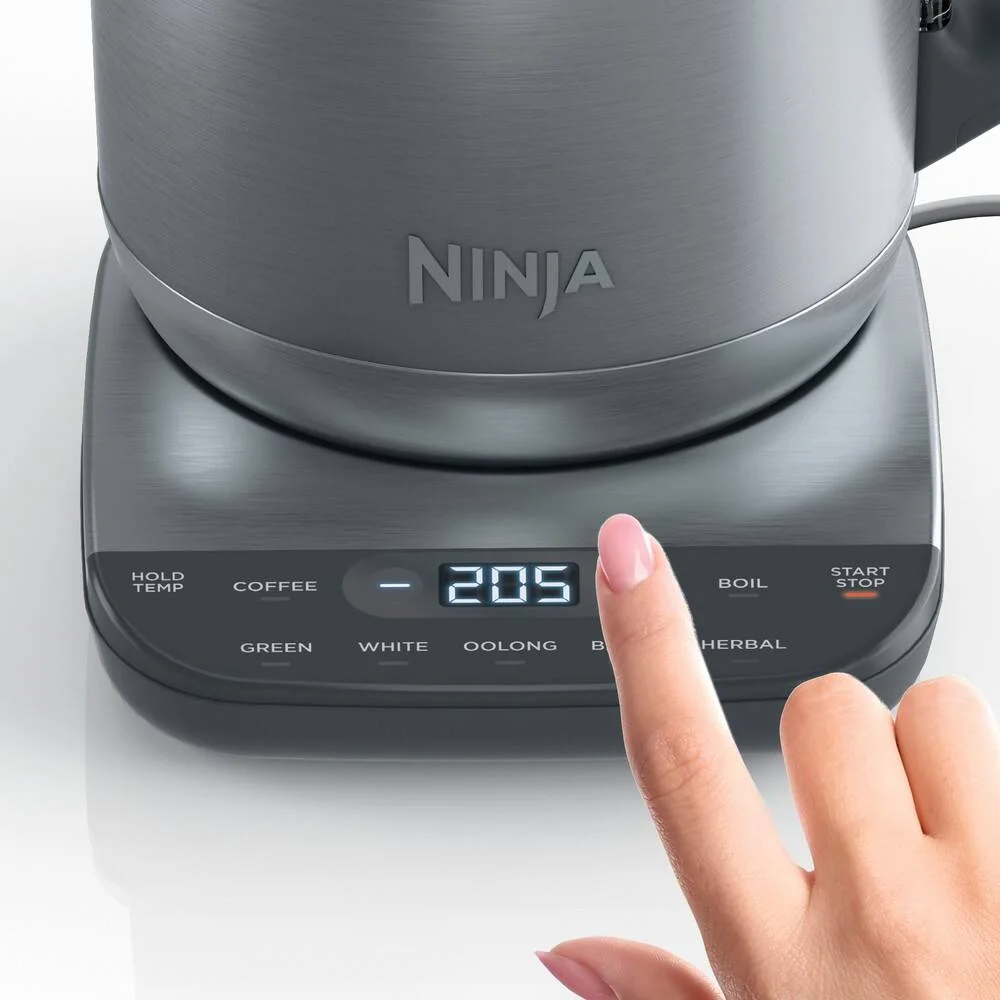 Ninja KT200 control panel with finger touching preset button
