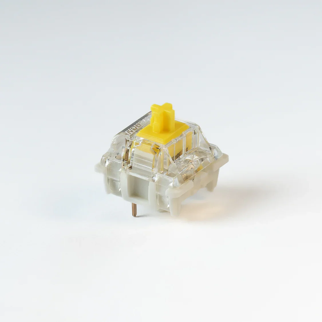 Gateron G Pro Yellow single switch close-up on light grey background