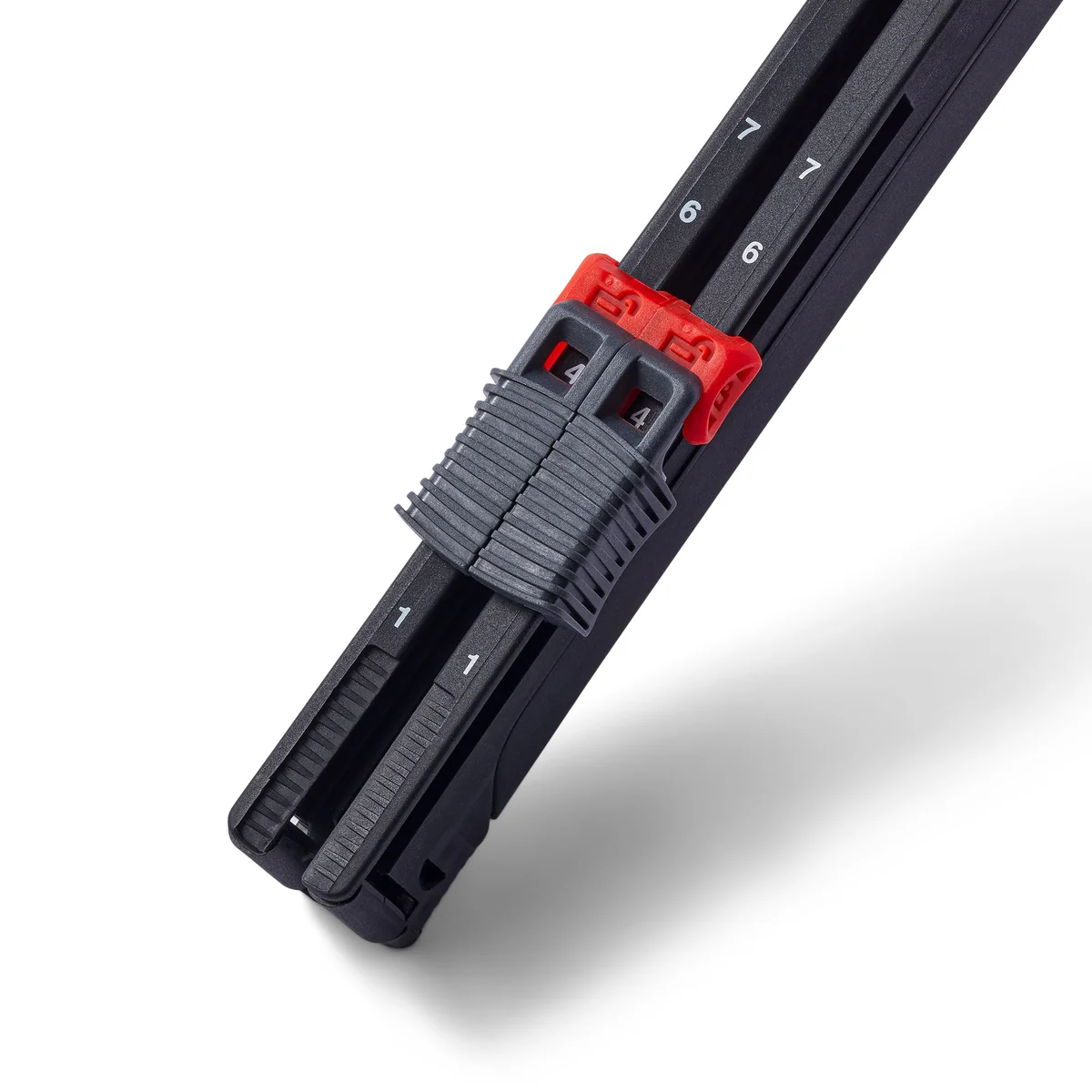 Roost Laptop Stand V3 close-up of red adjustment slider mechanism showing height positions