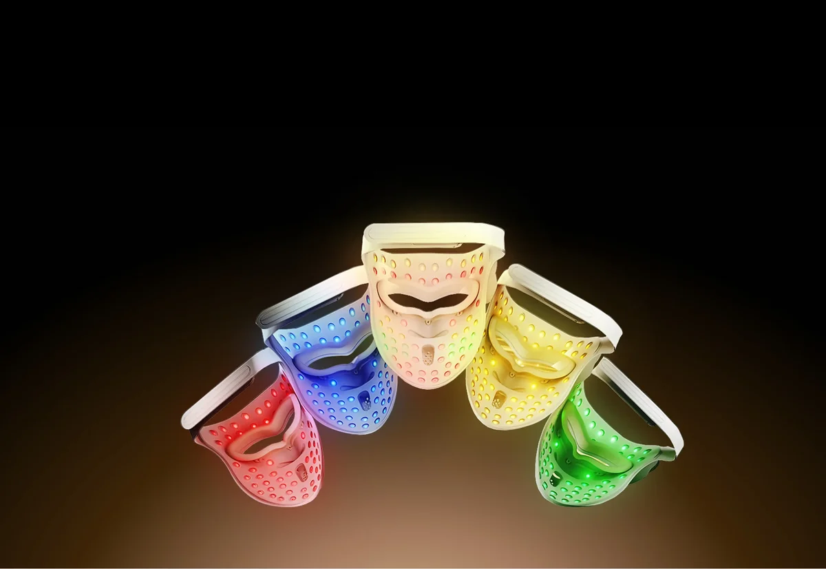 Inner LED side of the Dreame Chrona mask lit in red, blue, white, yellow and green, showing its five light modes
