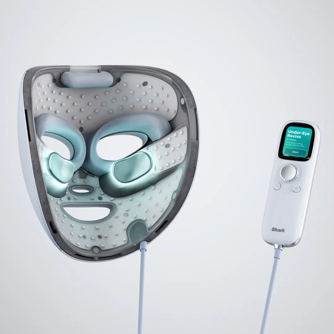 Inside view of the Shark CryoGlow LED Face Mask showing the LED panel layout and glowing under-eye cooling pads, with the remote set to Under-Eye Revive mode